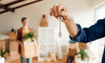 closeup-man-holding-key-his-new-home-1024x683-1