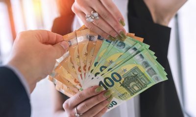 hands-young-beautiful-girl-hand-large-sum-new-euro-bills-business-concept-1024x684-1