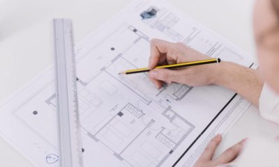 crop-woman-correcting-plans-1024x683-1